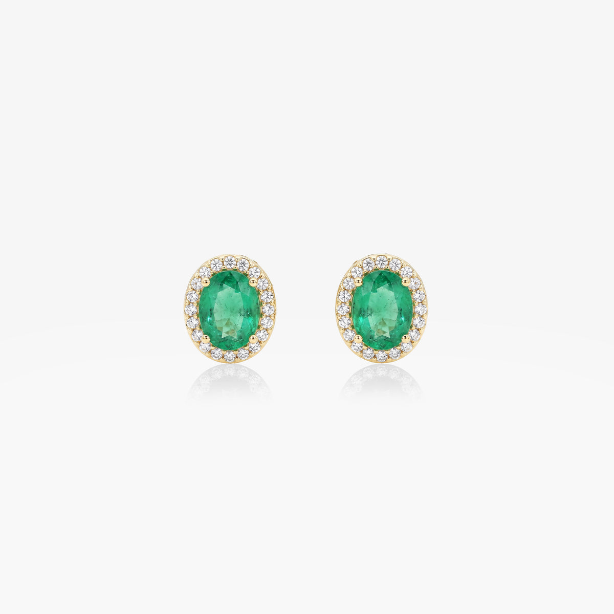 Cercei din aur galben 18K cu smaralde 0,81 ct și diamante 0,12 ct