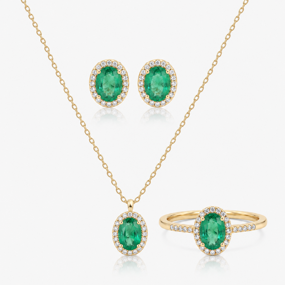Set cercei, colier și inel din aur 18K cu smaralde și diamante – Oval