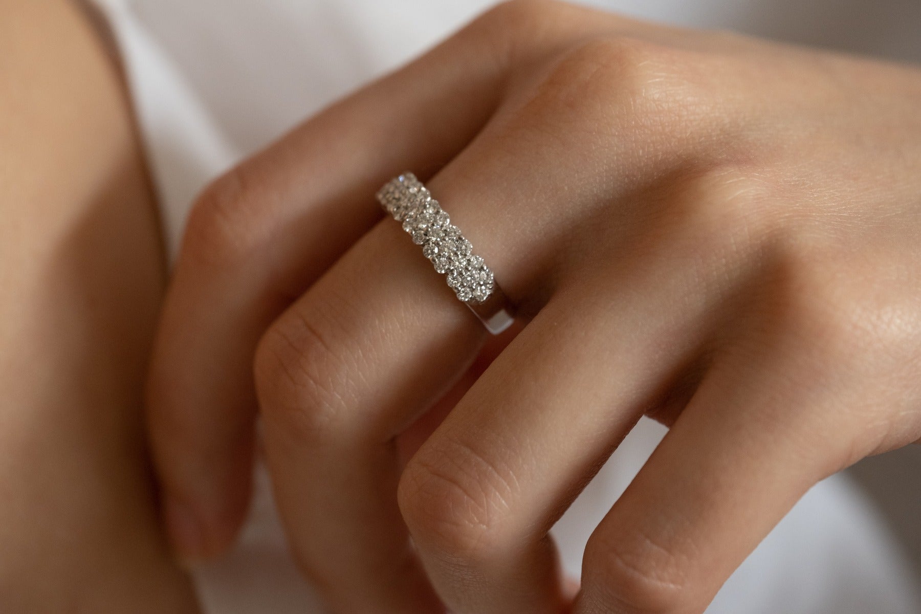 Iris ring with diamonds