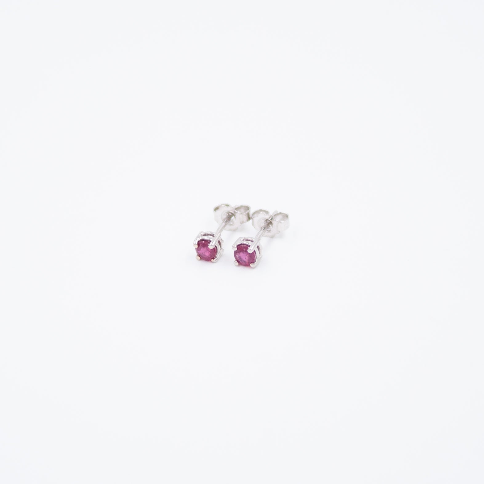Spotlight earrings with ruby